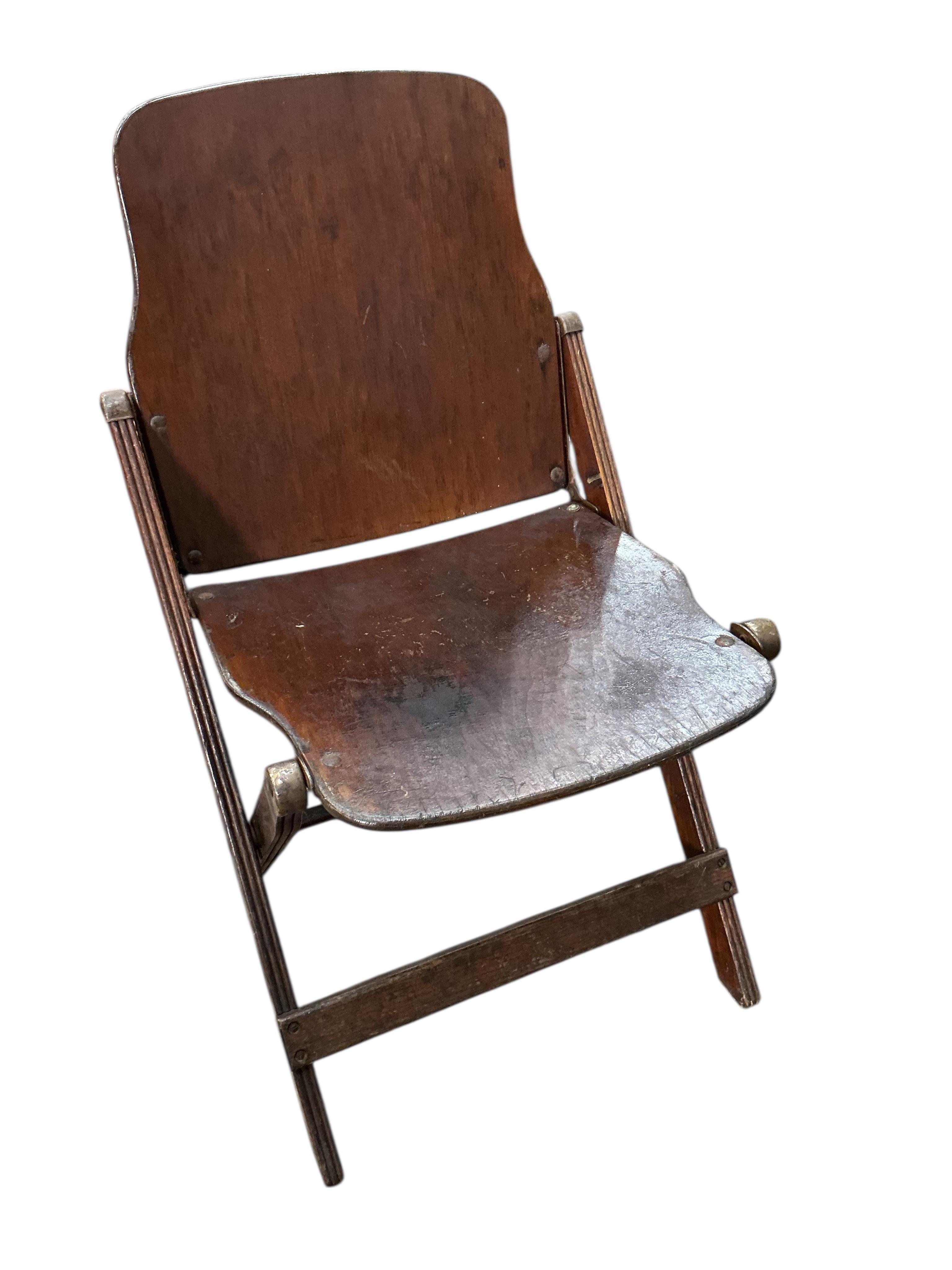 A pair of US administrative folding chairs, India, width 43cm, depth 39cm, height 76cm